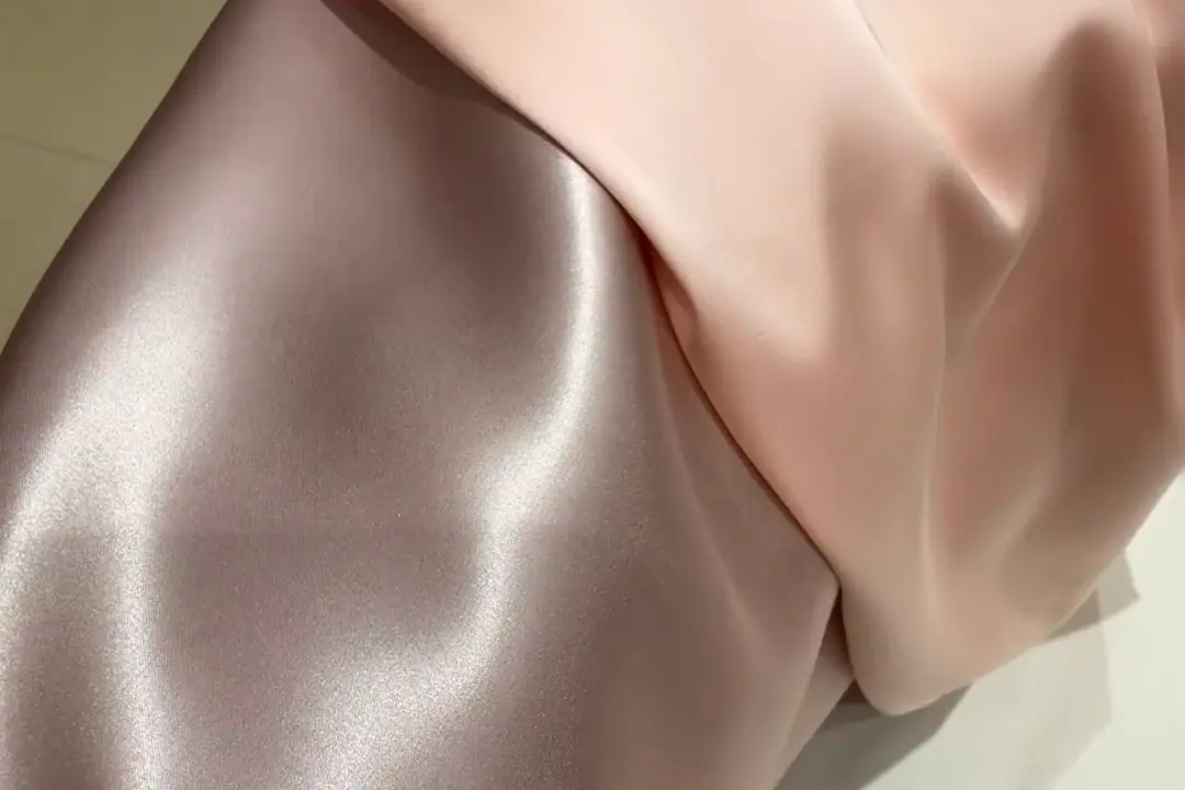 Satin fabric samples made from silk polyester and blended fibers
