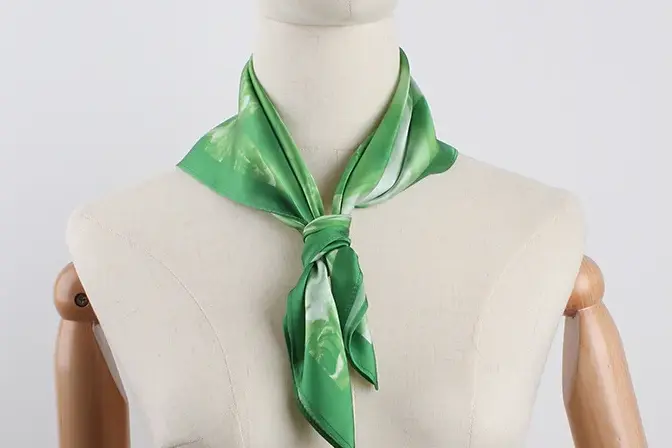 Green silk neck scarf.