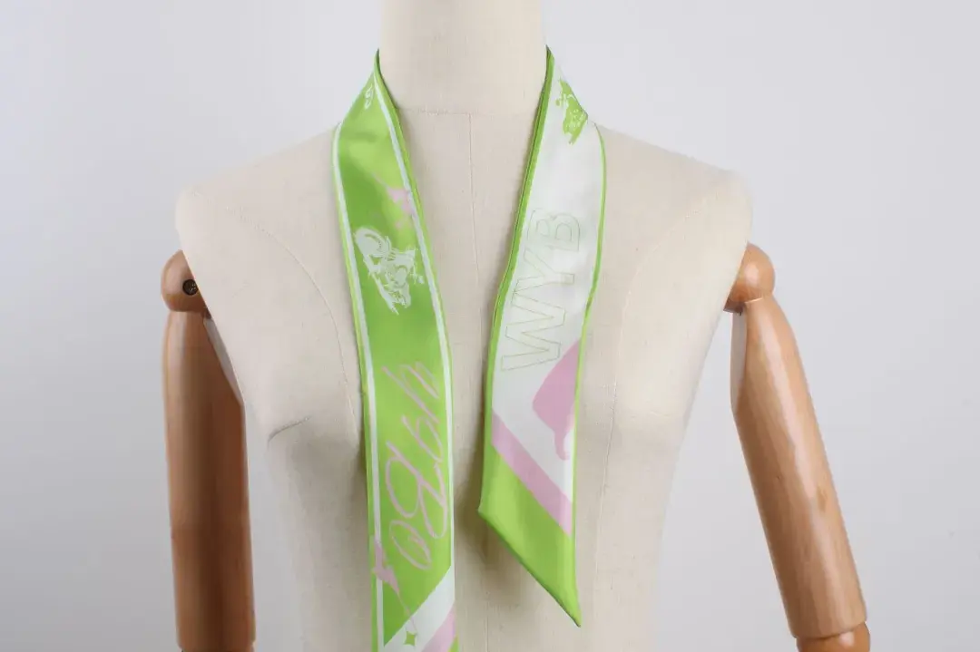 Green silk neck twilly.