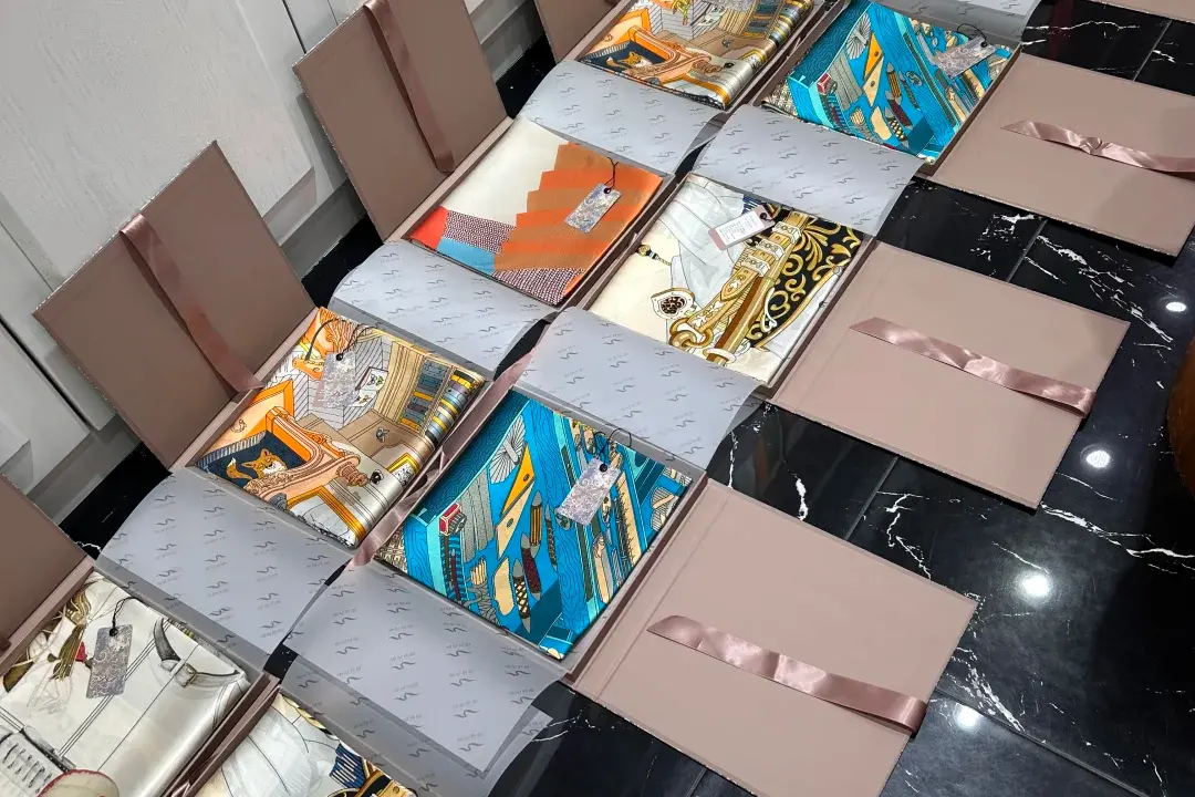 Packaged silk scarf boxes.