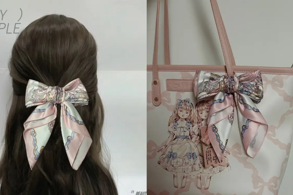 Printed silk hair bow.