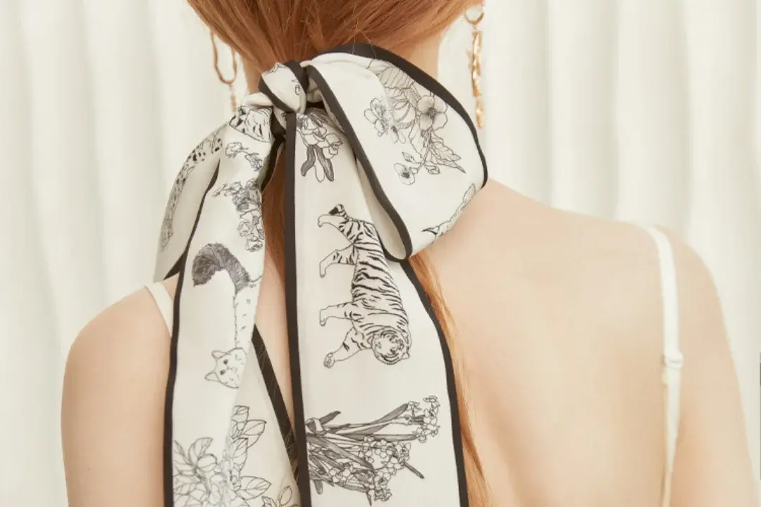 White printed hair scarf.