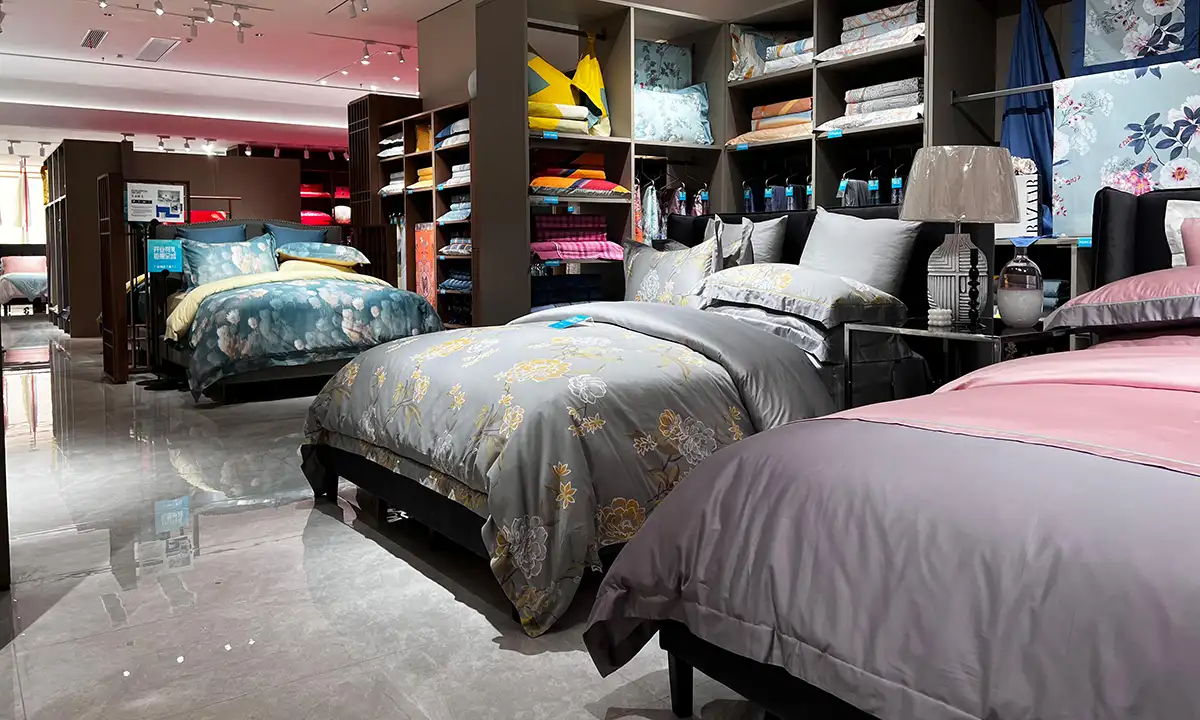 bedding sample room displaying various styles and products
