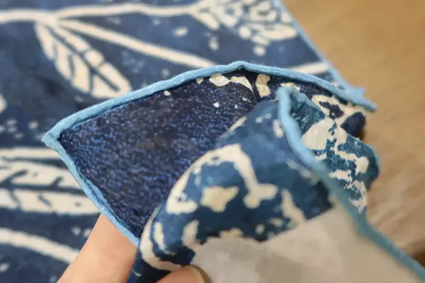 hand finished edges on luxury silk shawls