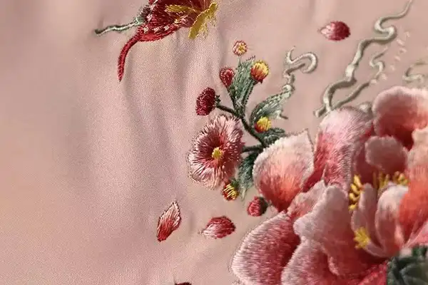 Custom embroidery on silk sleepwear branding