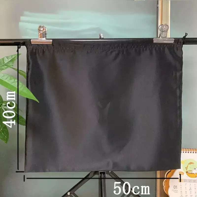 Large black satin handbag dust bag measuring 50 by 40 centimeters