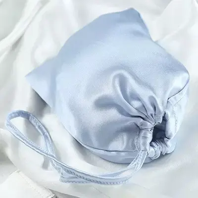 Light blue round-bottom silk drawstring jewelry pouch