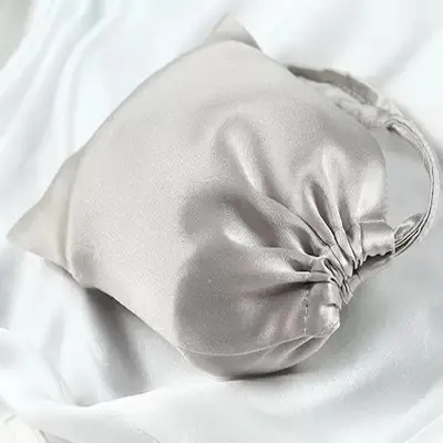 Silver round-bottom silk drawstring jewelry pouch