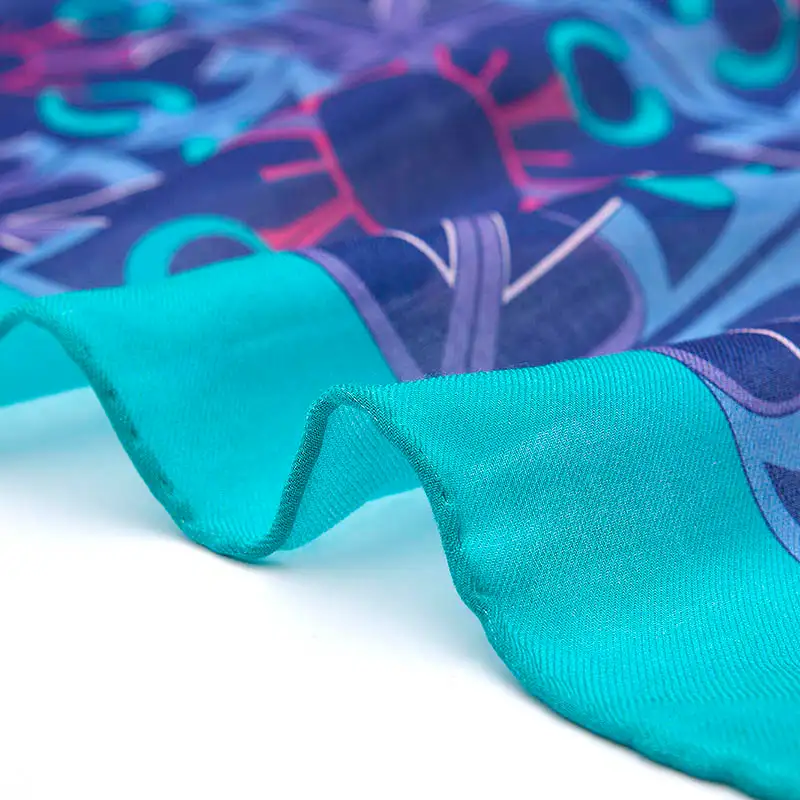 Rolled edge finish on long silk scarf