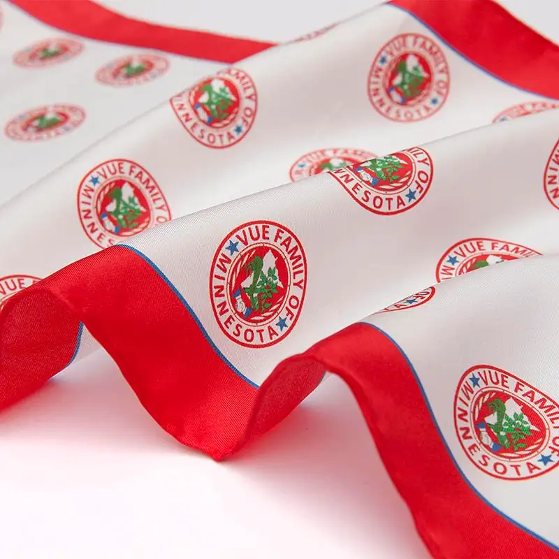 Close-up of branded pattern on custom long silk scarf