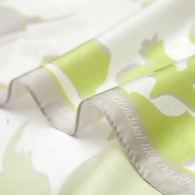 Detail view of custom silk satin long scarf texture