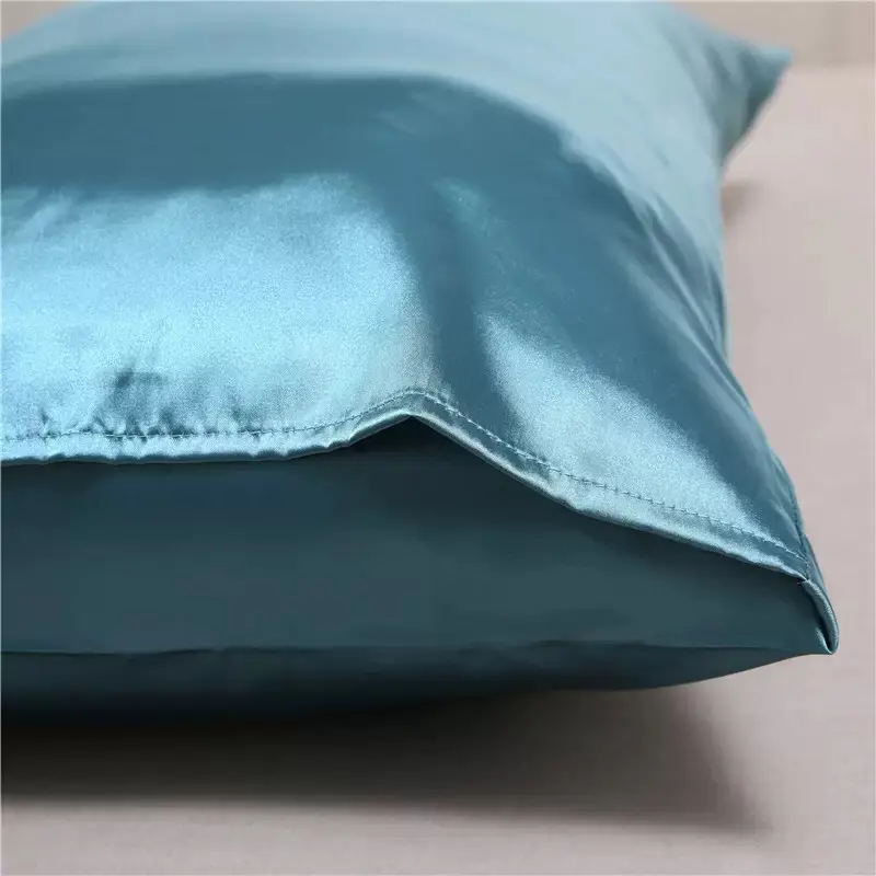 Envelope closure detail on silk pillowcase with smooth finish