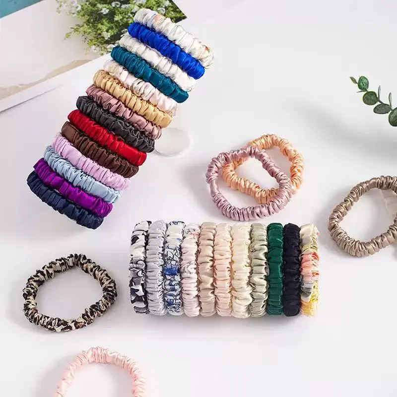 Luxury silk scrunchies customized for corporate gifts and client giveaways