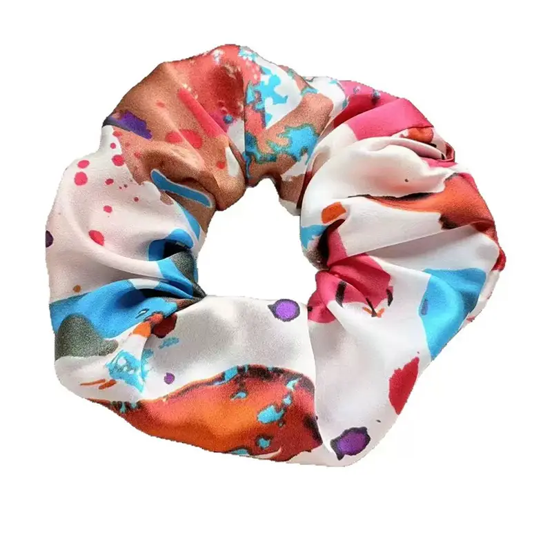 Printed silk scrunchies manufactured to custom designs and brand graphics