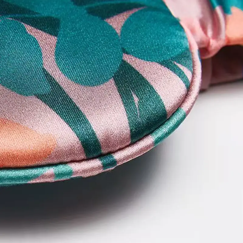 Printed silk sleep mask detail showing edge stitching