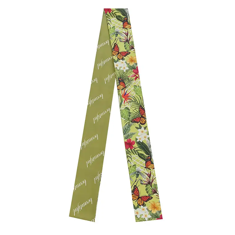 Fashion accessory silk twilly used as a neck and bag accent for luxury styling